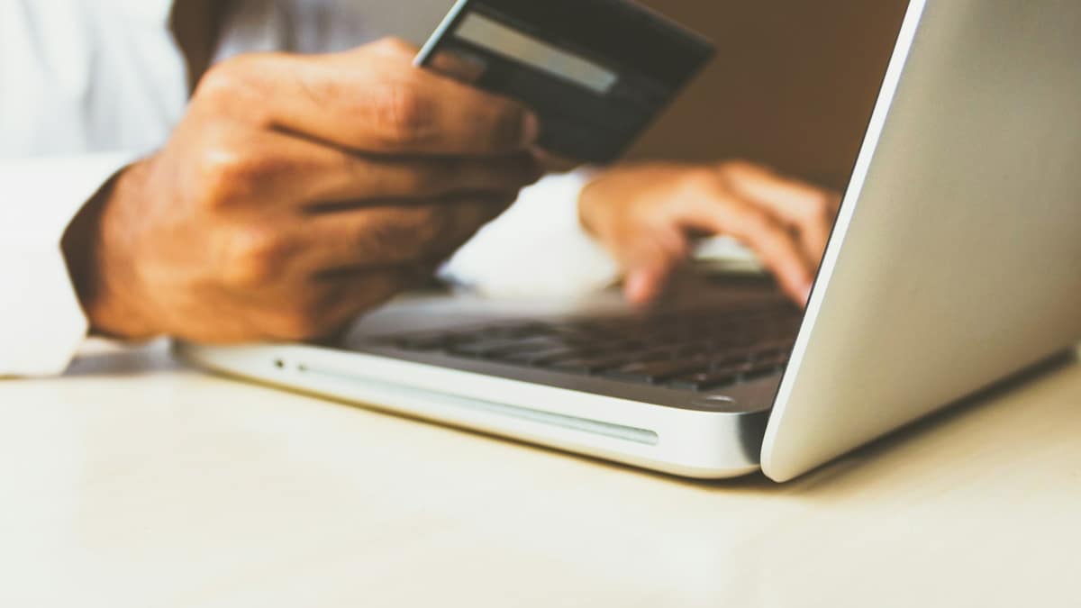 Person using a mobile payment app on a smartphone